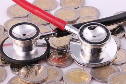 coins and stethoscope.