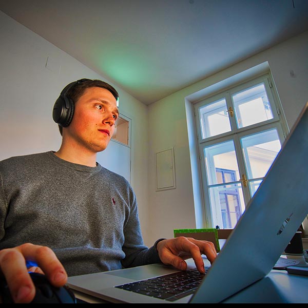 young man working at a computer