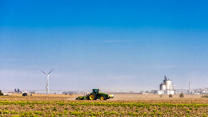 Photo of a tractor working in a field.